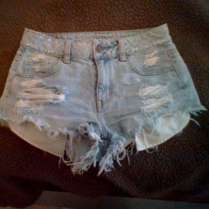 LIGHT BLUE RIPPED JEAN SHORTS